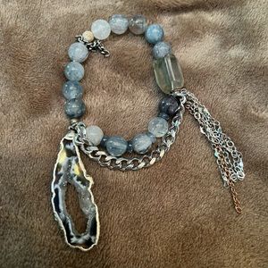 Gray blue crystal stones… bracelet with stretch to fit all sizes.